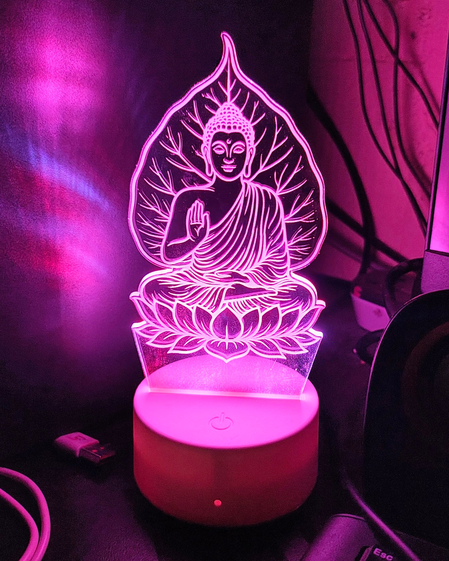 Gautam Buddha 3D LED illusion lamp by Glow X Art, perfect for calming home decor and spiritual gifting, luminous acrylic Buddha lamp creating peaceful meditation ambiance, artistic Glow X Art LED lamp for serene living rooms and mindful spaces, intricately designed 3D Buddha night lamp ideal for yoga studios and personal altars, elegant Glow X Art Buddha lamp glowing softly for relaxation and wellness, unique spiritual gift lamp by Glow X Art for friends and family, glowing 3D Buddha lamp enhancing tranquil
