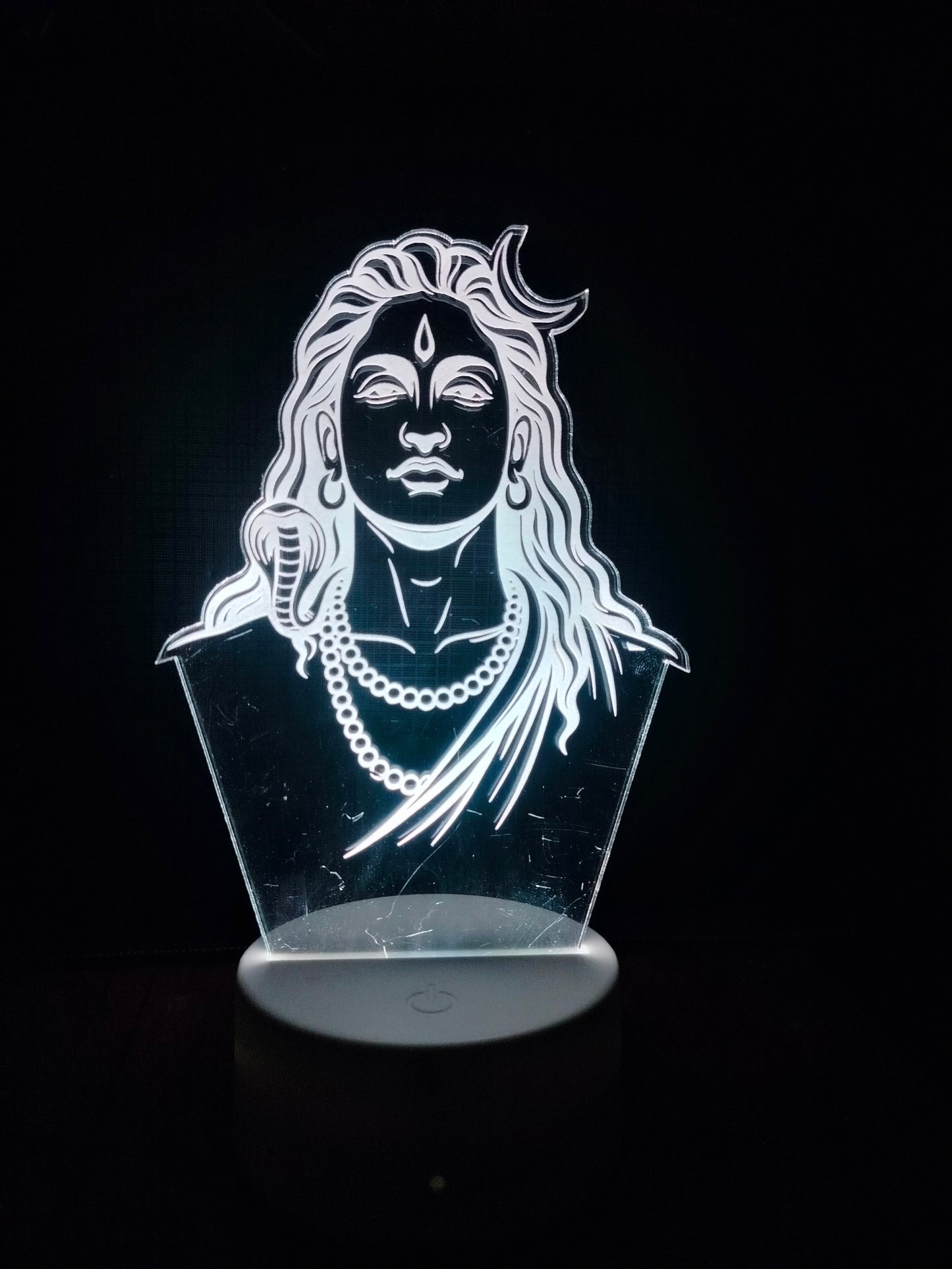 Adiyogi lamp with Glowxart packaging box
Unboxed Adiyogi LED lamp and box
Spiritual gift lamp with branded packaging
Glowxart Adiyogi night lamp with package