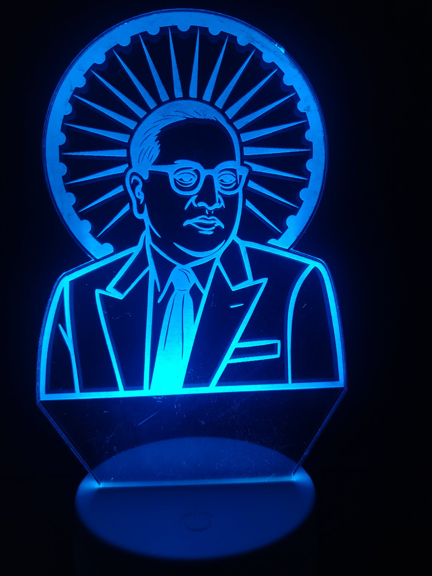 Close-up of Ambedkar's face on 3D acrylic lamp
Dr. Babasaheb Ambedkar portrait detail in LED light
Zoomed face view on laser-etched Ambedkar lamp
Detailed engraving of Ambedkar with Ashok Chakra