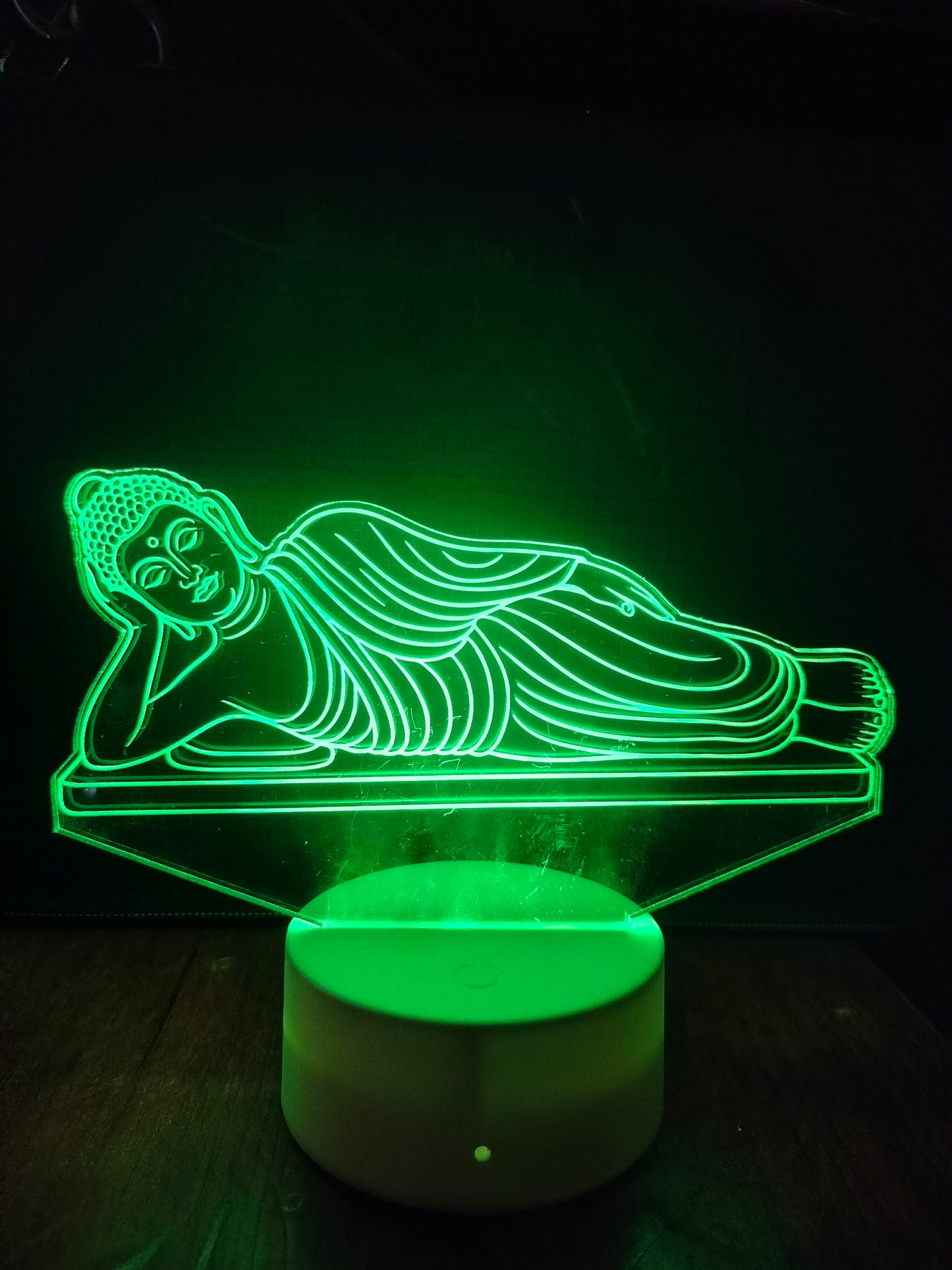 Height and width of reclining Buddha LED lamp
Product size of Buddha illusion light shown with ruler
LED lamp dimensions for home decor use
Measurement guide for Buddha 3D acrylic lamp