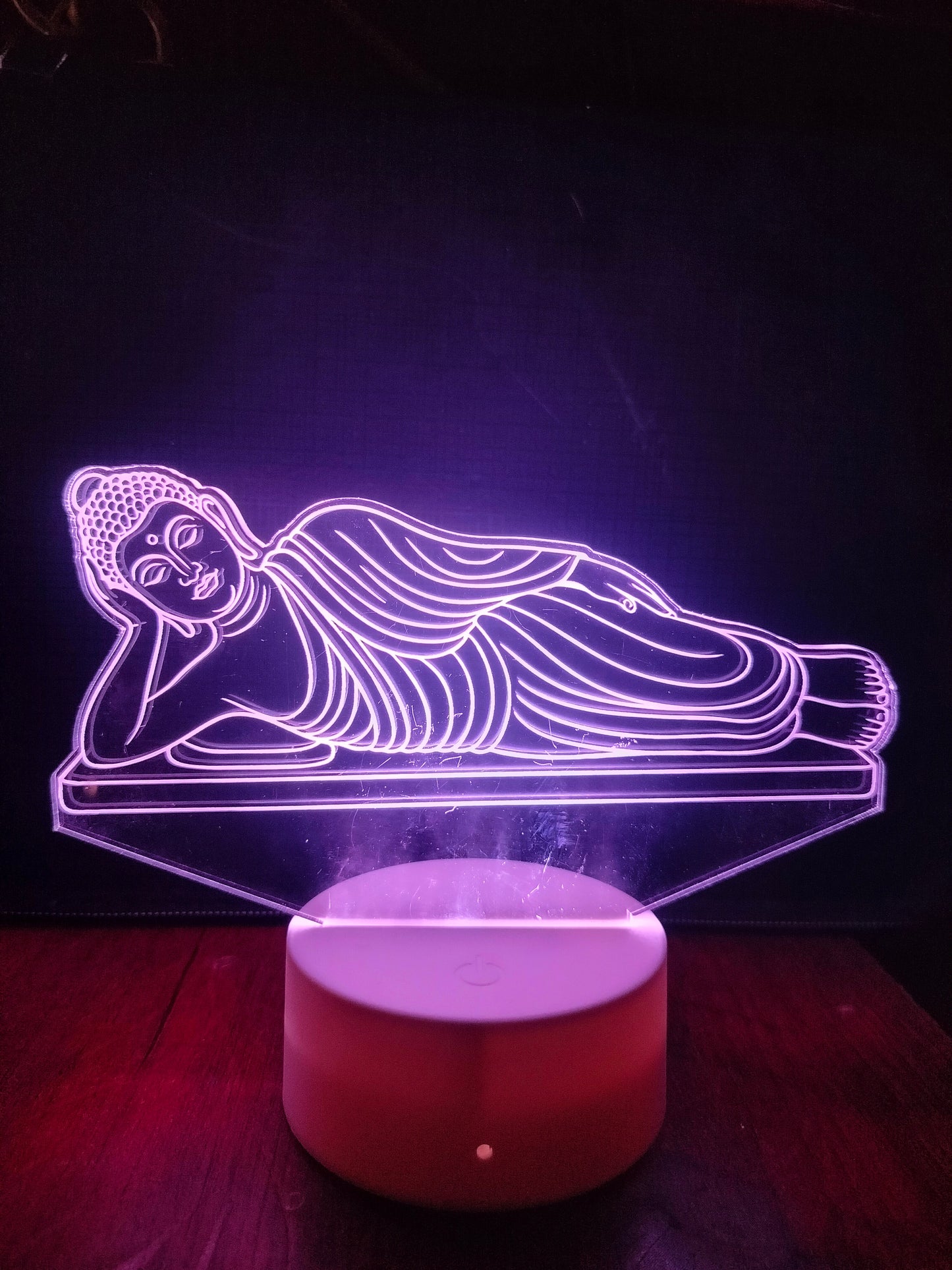 Buddha 3D lamp placed on wooden table or altar
Spiritual acrylic light of reclining Buddha on shelf
LED Buddha lamp as home decor for calm spaces
Glowxart Reclining Buddha lamp on tabletop