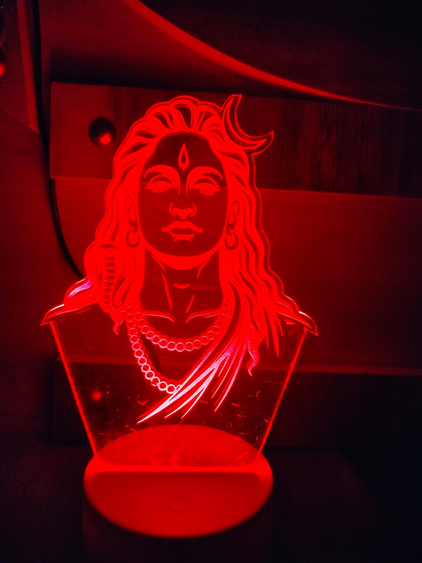 Transparent Adiyogi acrylic design in sunlight
Daytime view of Adiyogi 3D lamp
Adiyogi LED lamp with natural daylight
Acrylic Adiyogi illusion light during day