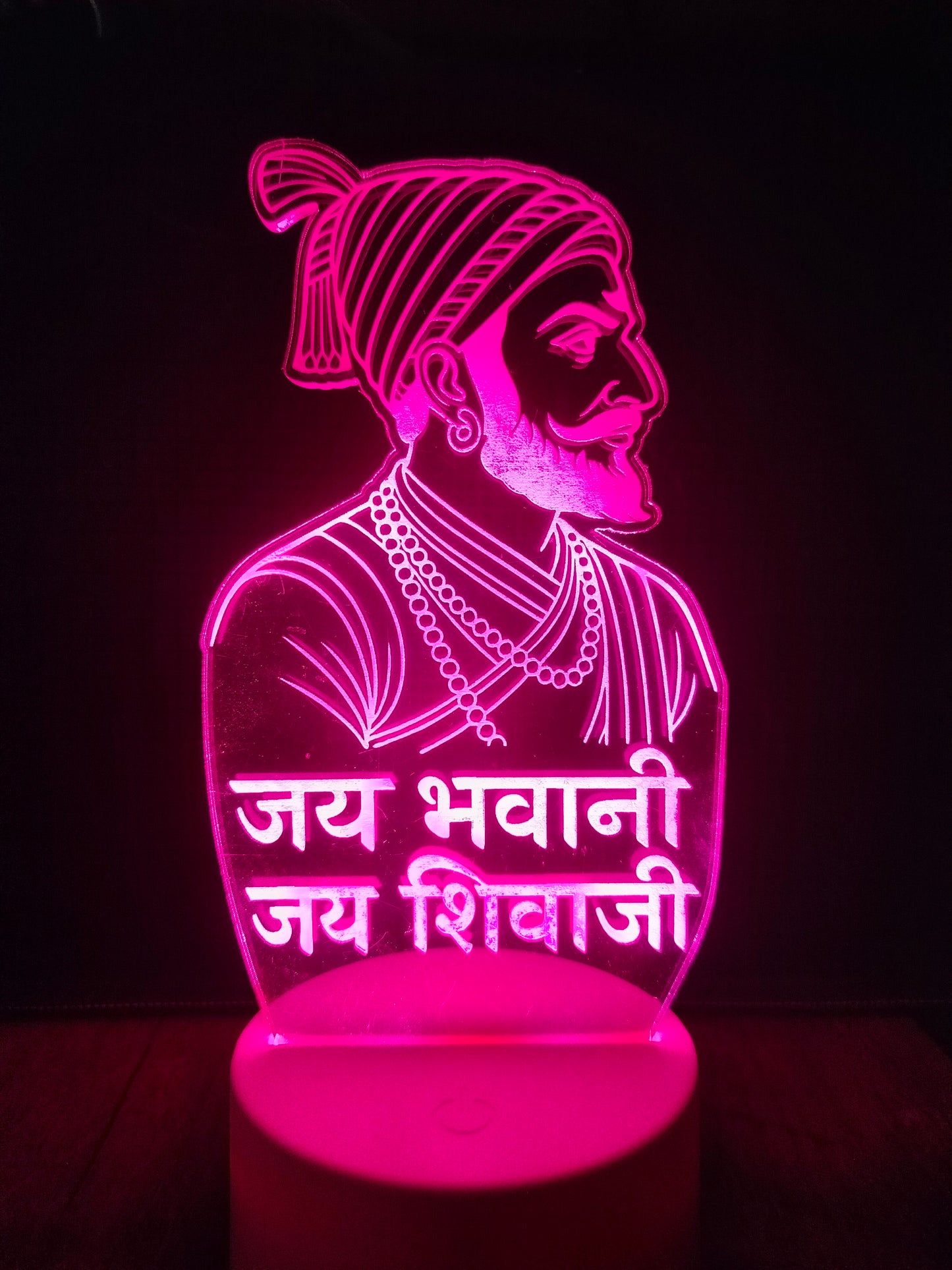 Shivaji Maharaj lamp used in pooja room decor
Spiritual setup with diya and LED Shivaji lamp
Traditional Indian decor with Shivaji Maharaj portrait light
LED illusion lamp used in pooja or temple corner
