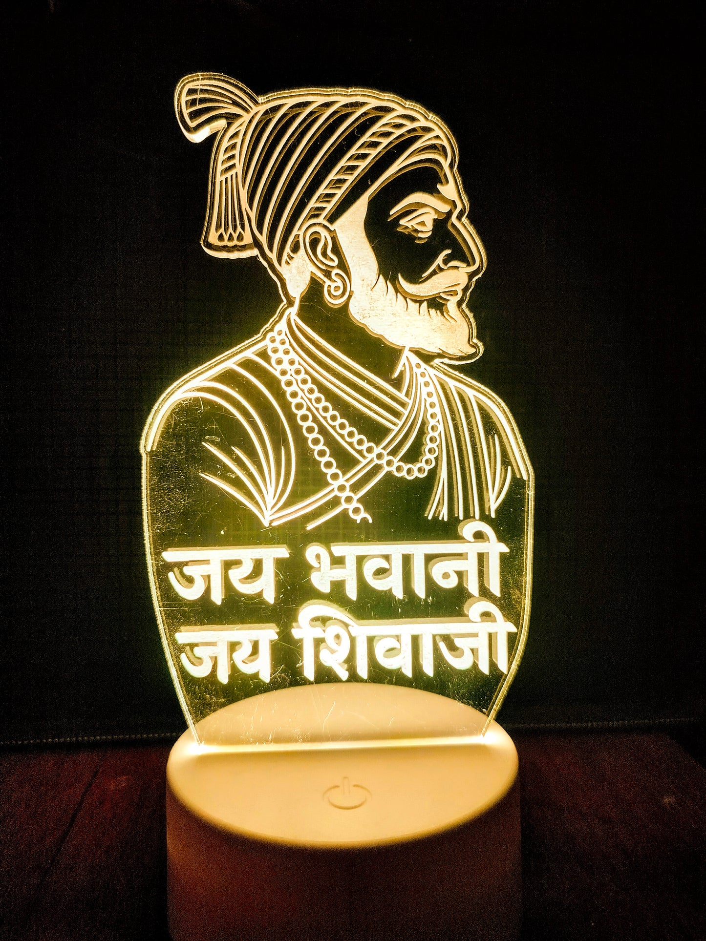 3D LED portrait lamp of Chatrapati Shivaji Maharaj glowing
Glowing Shivaji Maharaj acrylic LED lamp front view
Spiritual 3D illusion light of Shivaji Maharaj portrait
Shivaji Maharaj LED night lamp glowing in dark