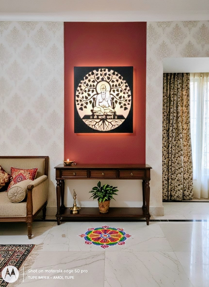 Decorative interior with a Shree Swami Samarth artwork on a red wall, a console table, and a colorful Rangoli design on the floor. Swami samarth led wall hanging . Swami samarth led frame 
