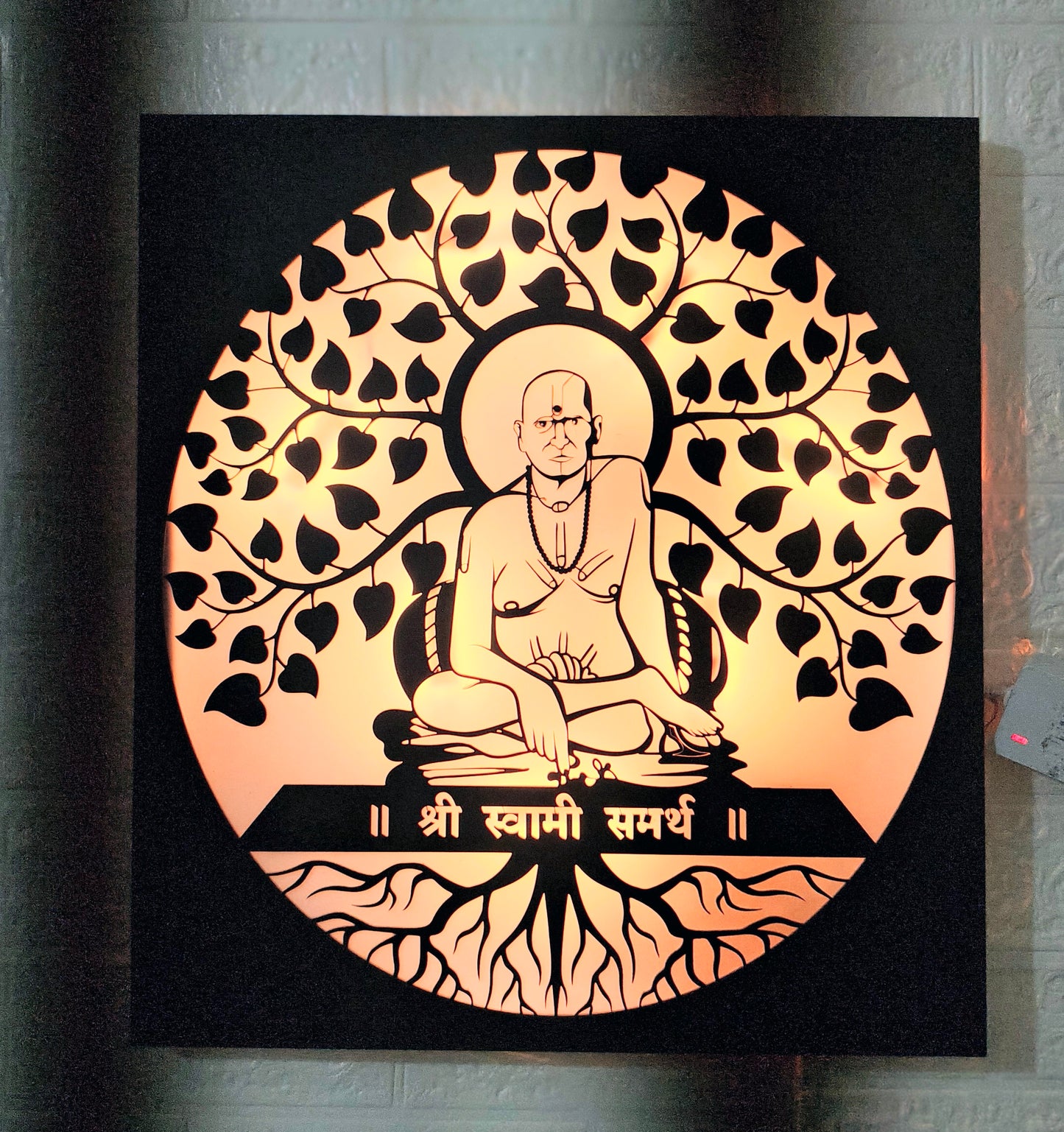 Decorative wall art with a seated figure and tree design on a black  background Shri Swami Samarth LED wall hanging 16 inch design

Swami Samarth backlit acrylic wall art by Glow X Art

Warm LED spiritual wall frame of Swami Samarth

Laser cut Swami Samarth wall décor with LED light

Divine Swami Samarth acrylic silhouette lamp

Home temple LED wall hanging of Swami Samarth
