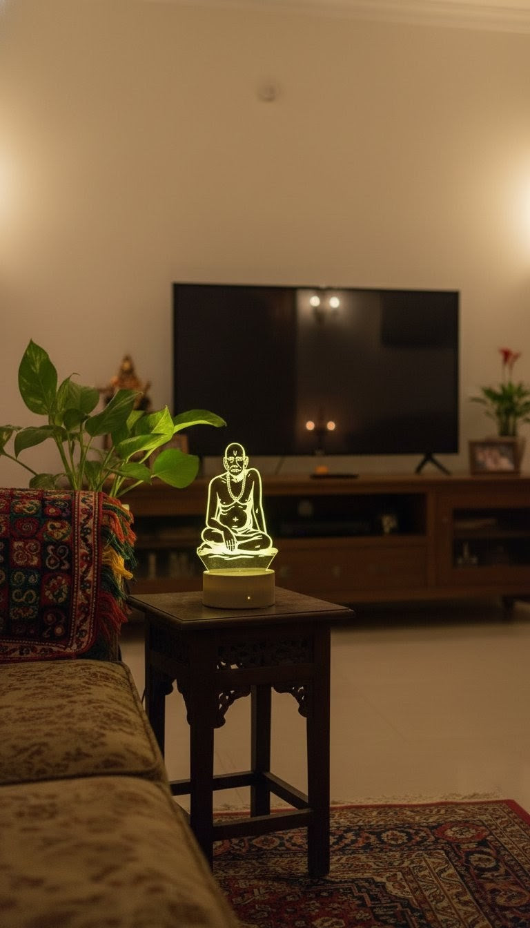 LED idol, Shri Swami Samarth, modern living room, side table decor.Swami Samarth light, home living space, potted plant decor, modern electronics.
