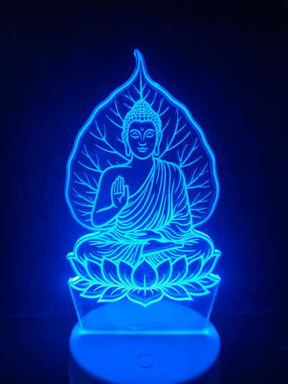Meditation lamp of Buddha placed on wooden table

Spiritual home decor lamp of Buddha and Bodhi tree

3D LED Buddha lamp on altar or prayer space

Glowxart acrylic lamp featuring enlightenment scene