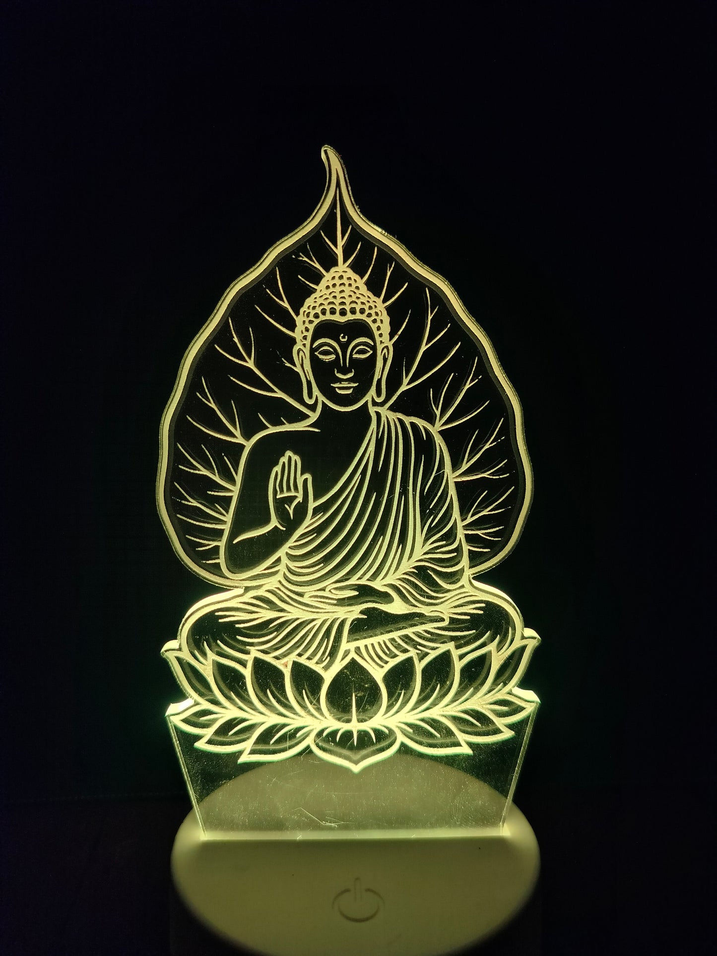 Gautam Buddha sitting under Bodhi tree LED lamp

3D illusion lamp of Buddha meditating beneath peepal tree

Spiritual night light showing Buddha's enlightenment moment

LED portrait lamp of Gautam Buddha with tree of wisdom

