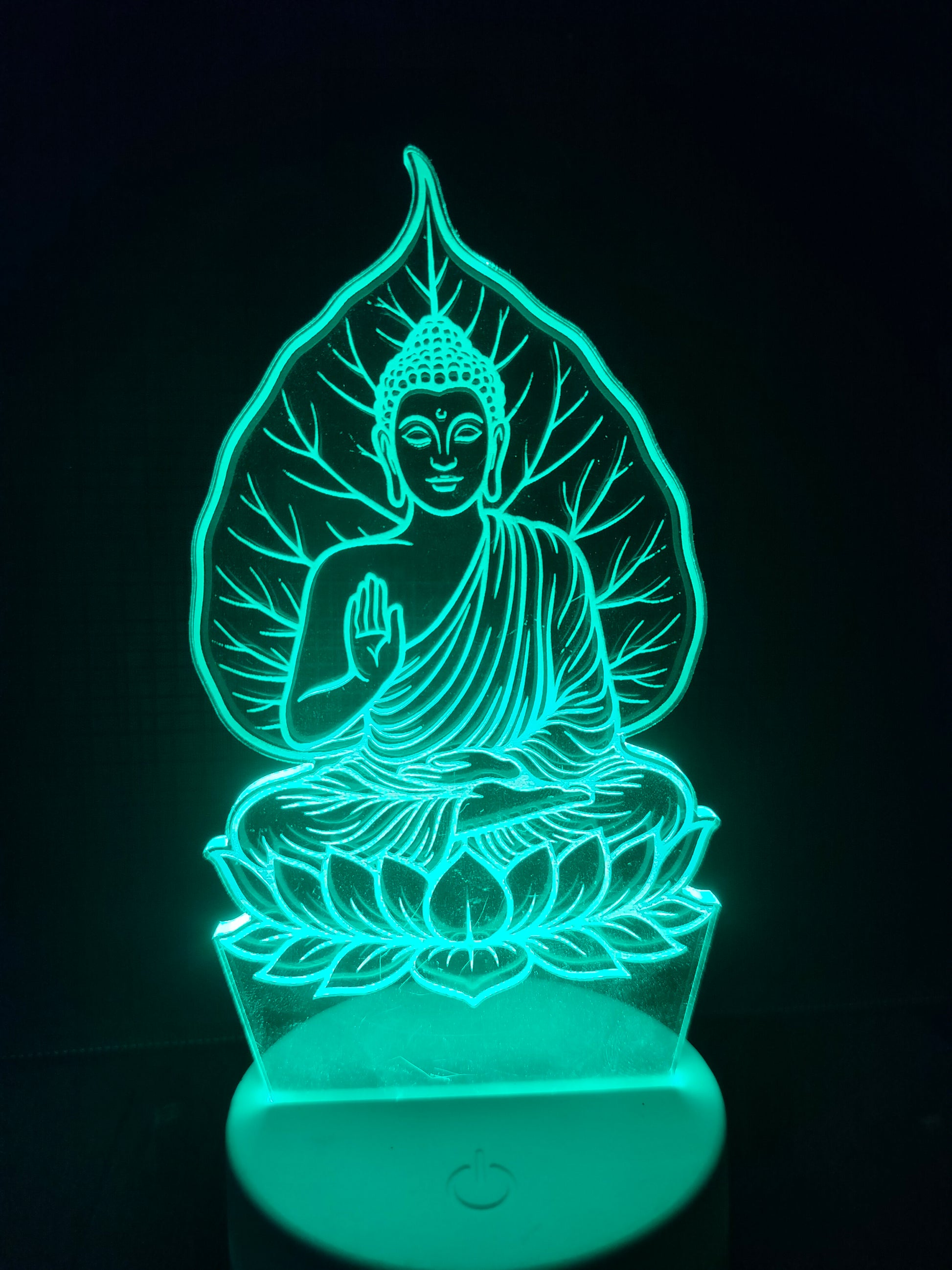 Color changing Buddha LED lamp under Bodhi tree

Enlightenment scene in multicolor glow mode

Buddha with tree illusion lamp in red, green, blue

LED spiritual lamp showing color modes for meditation