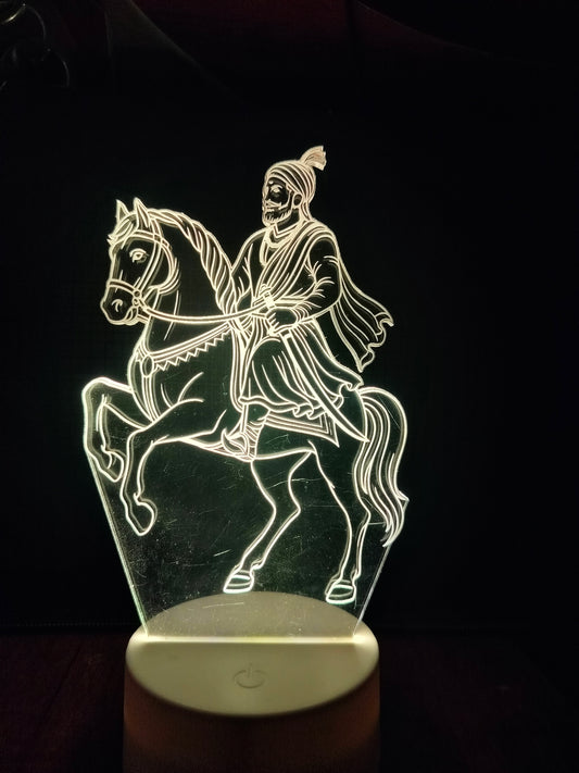 Side view of Shivaji Maharaj LED lamp

Shivaji Maharaj 3D illusion light from angle

Laser-engraved acrylic of Shivaji Maharaj on horse

LED acrylic lamp showing Shivaji Maharaj in motion